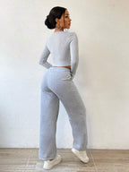 Solid Color Round Neck Top With Exposed Stitching And Waist Belt & Pocket Detail Pants shein