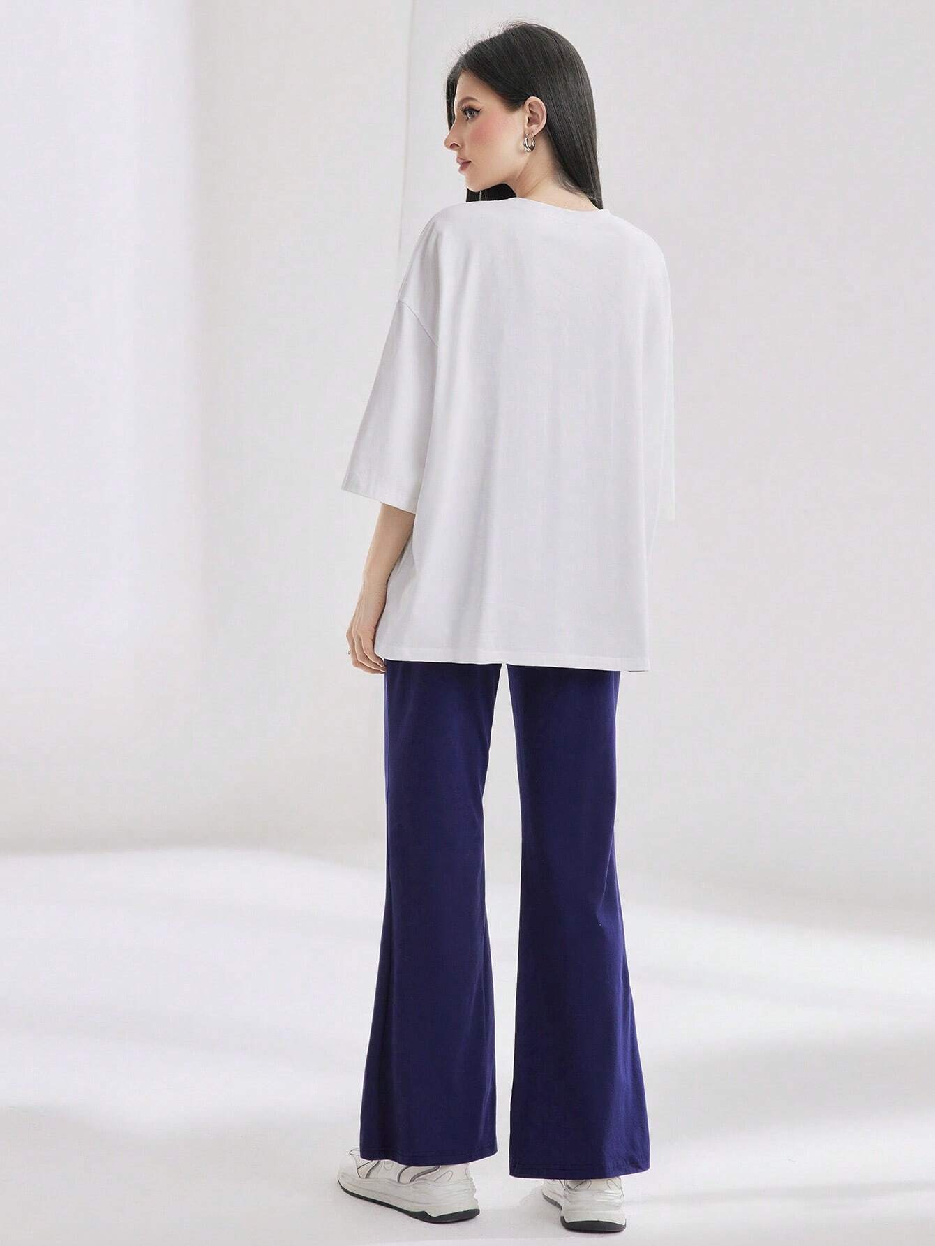 Mulvari Women Spring/Summer Casual Loose Fit Drop Shoulder Short Sleeve Top And Flared Pants Set shein