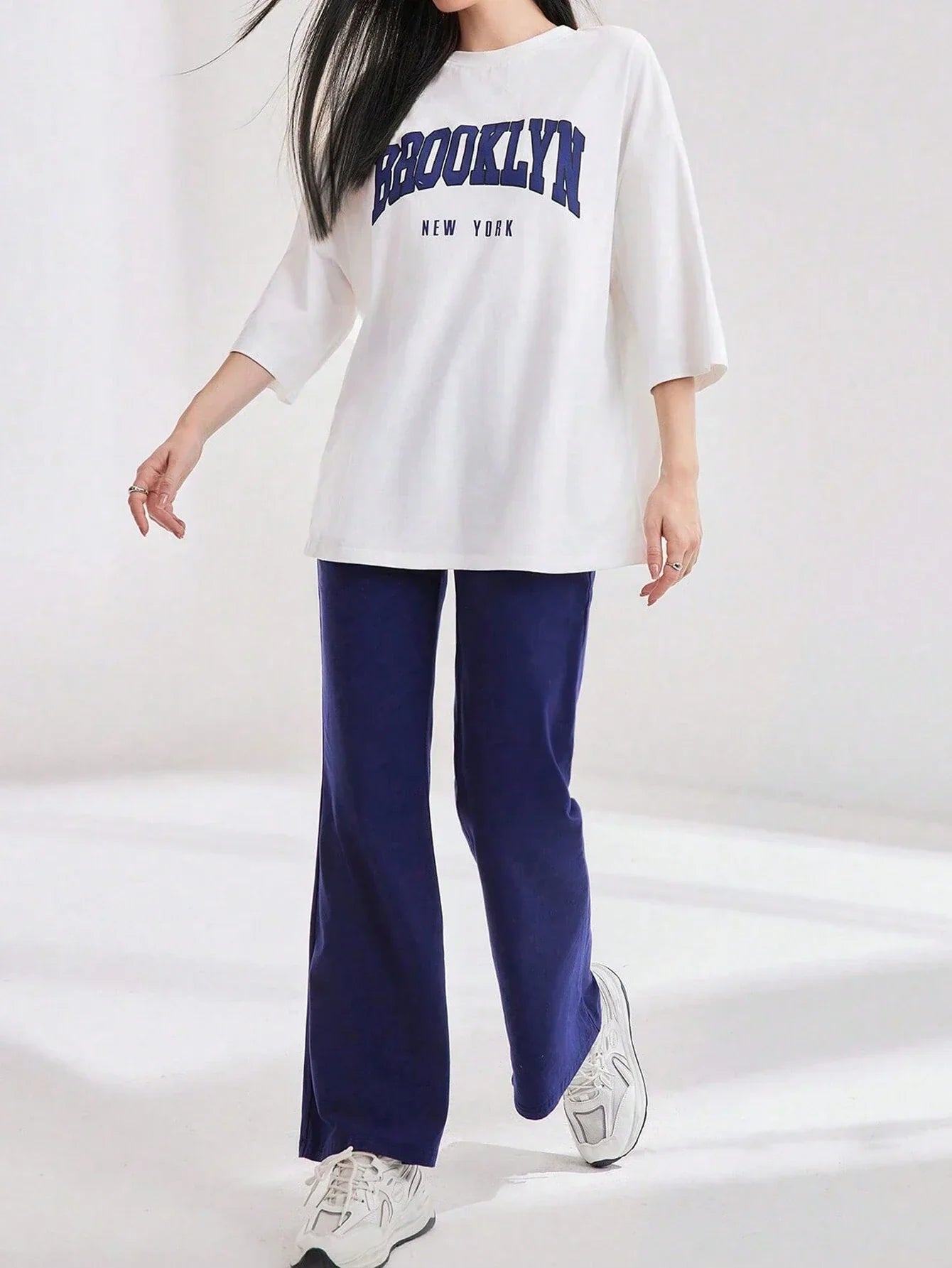 Mulvari Women Spring/Summer Casual Loose Fit Drop Shoulder Short Sleeve Top And Flared Pants Set shein