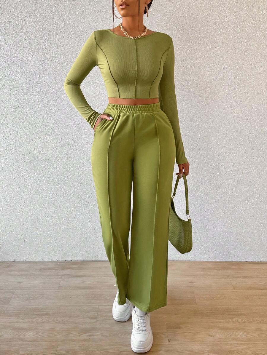 Solid Color Round Neck Top With Exposed Stitching And Waist Belt & Pocket Detail Pants shein
