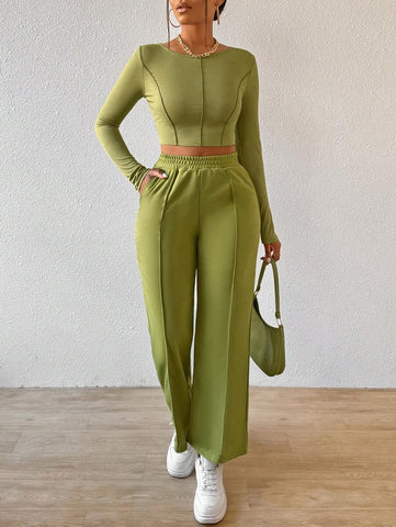 Solid Color Round Neck Top With Exposed Stitching And Waist Belt & Pocket Detail Pants