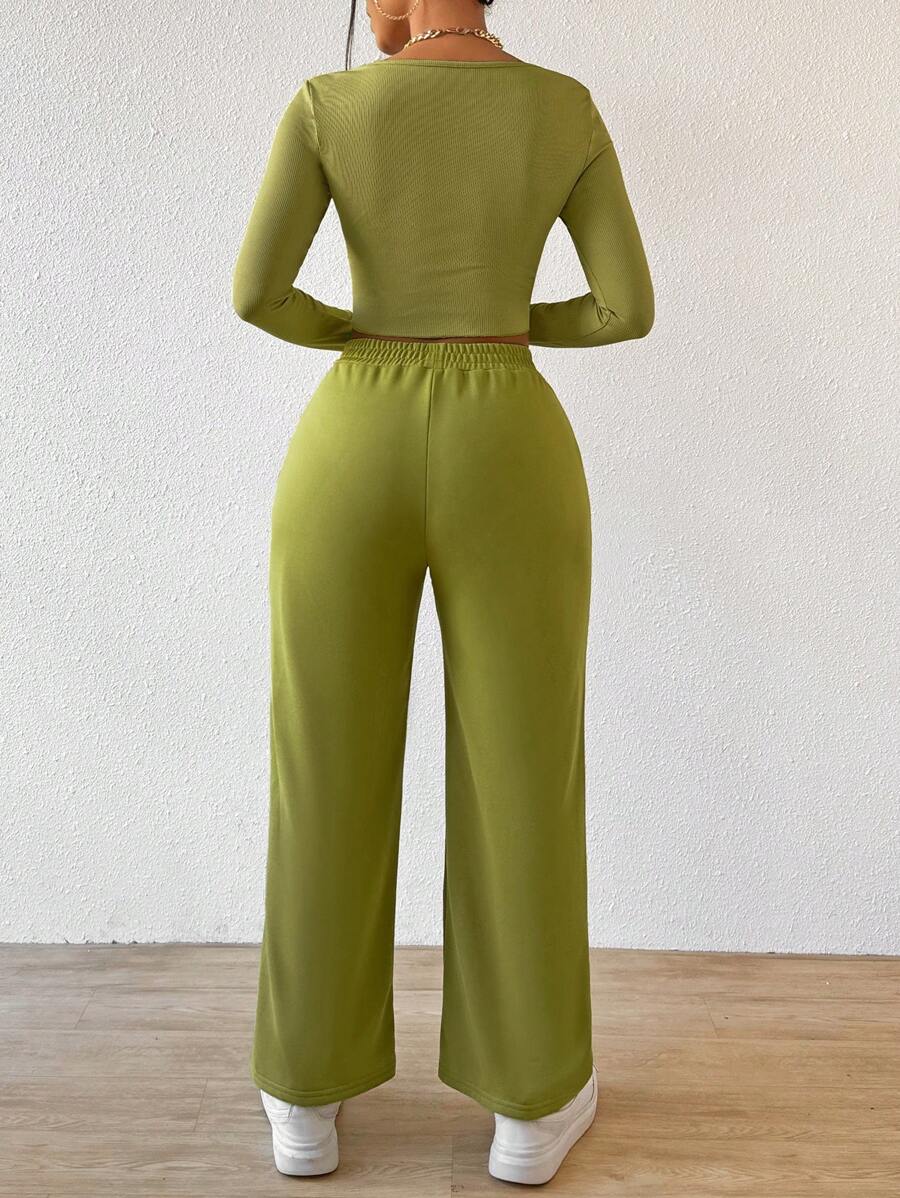 Solid Color Round Neck Top With Exposed Stitching And Waist Belt & Pocket Detail Pants shein