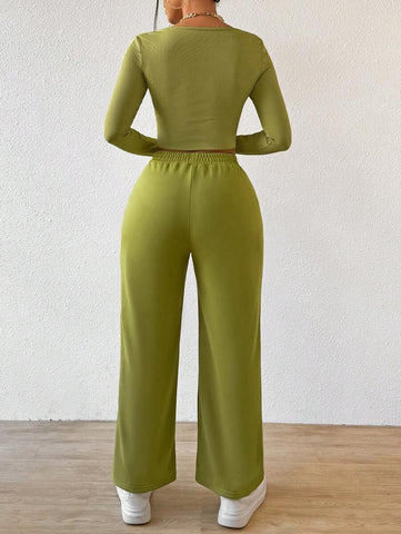 Solid Color Round Neck Top With Exposed Stitching And Waist Belt & Pocket Detail Pants