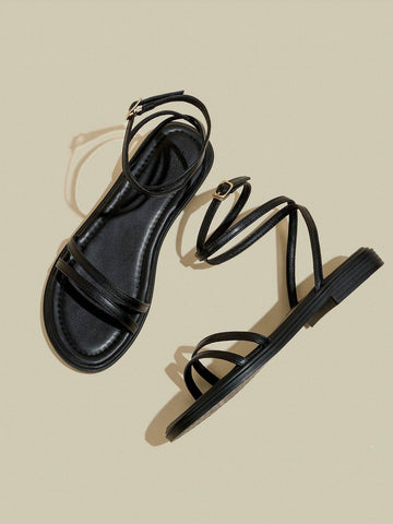 Women's Black Flat Sandals With Crossed Straps & Tie-Up Laces