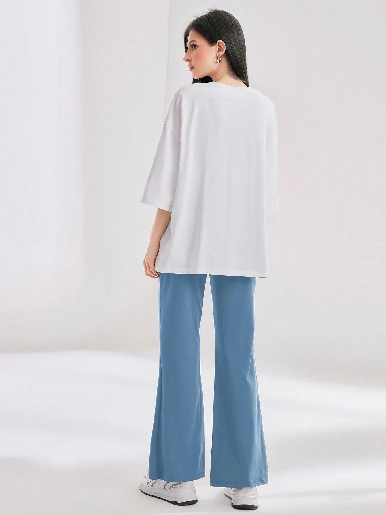 Mulvari Women Spring/Summer Casual Loose Fit Drop Shoulder Short Sleeve Top And Flared Pants Set shein