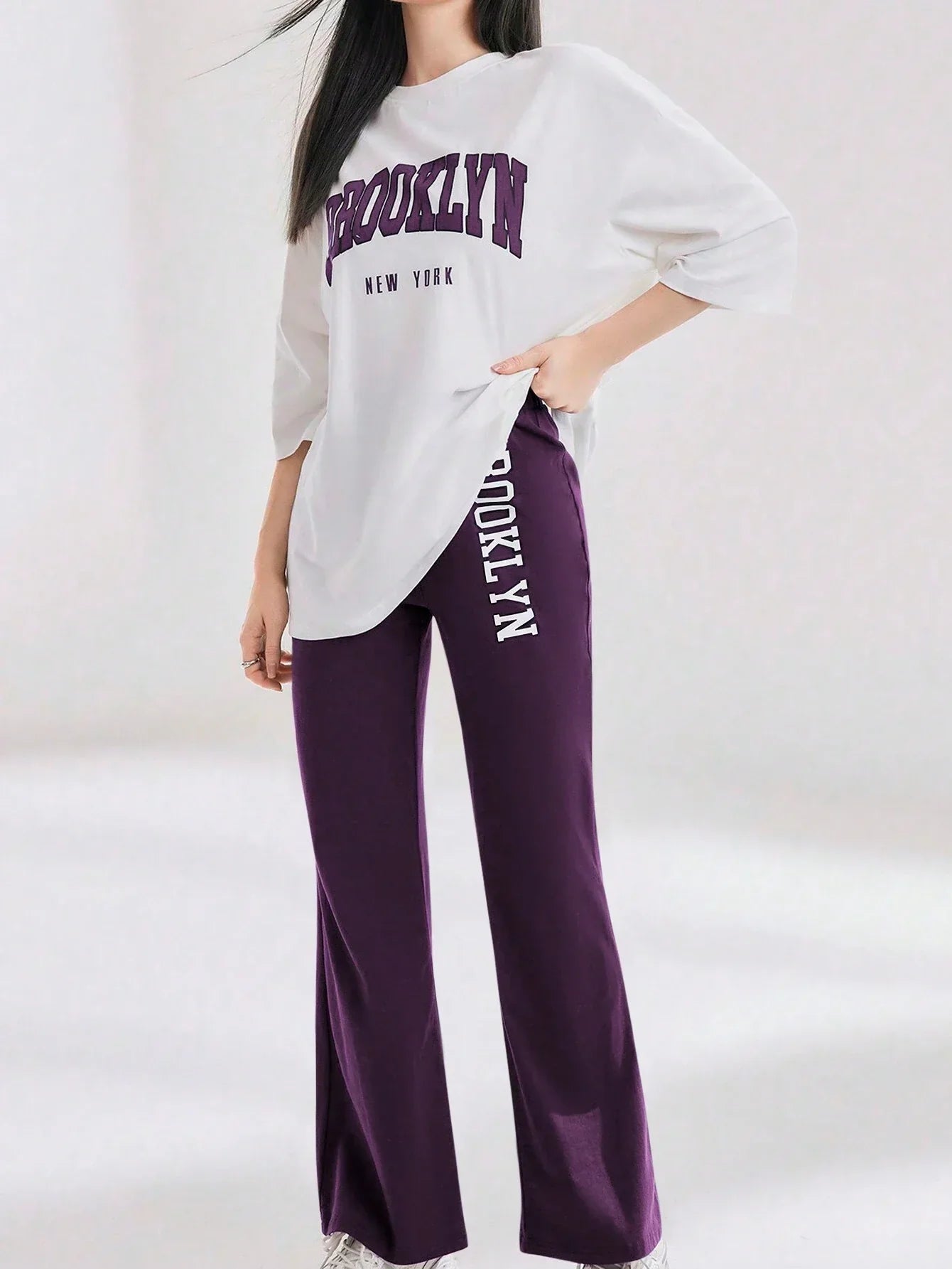 Mulvari Women Spring/Summer Casual Loose Fit Drop Shoulder Short Sleeve Top And Flared Pants Set shein