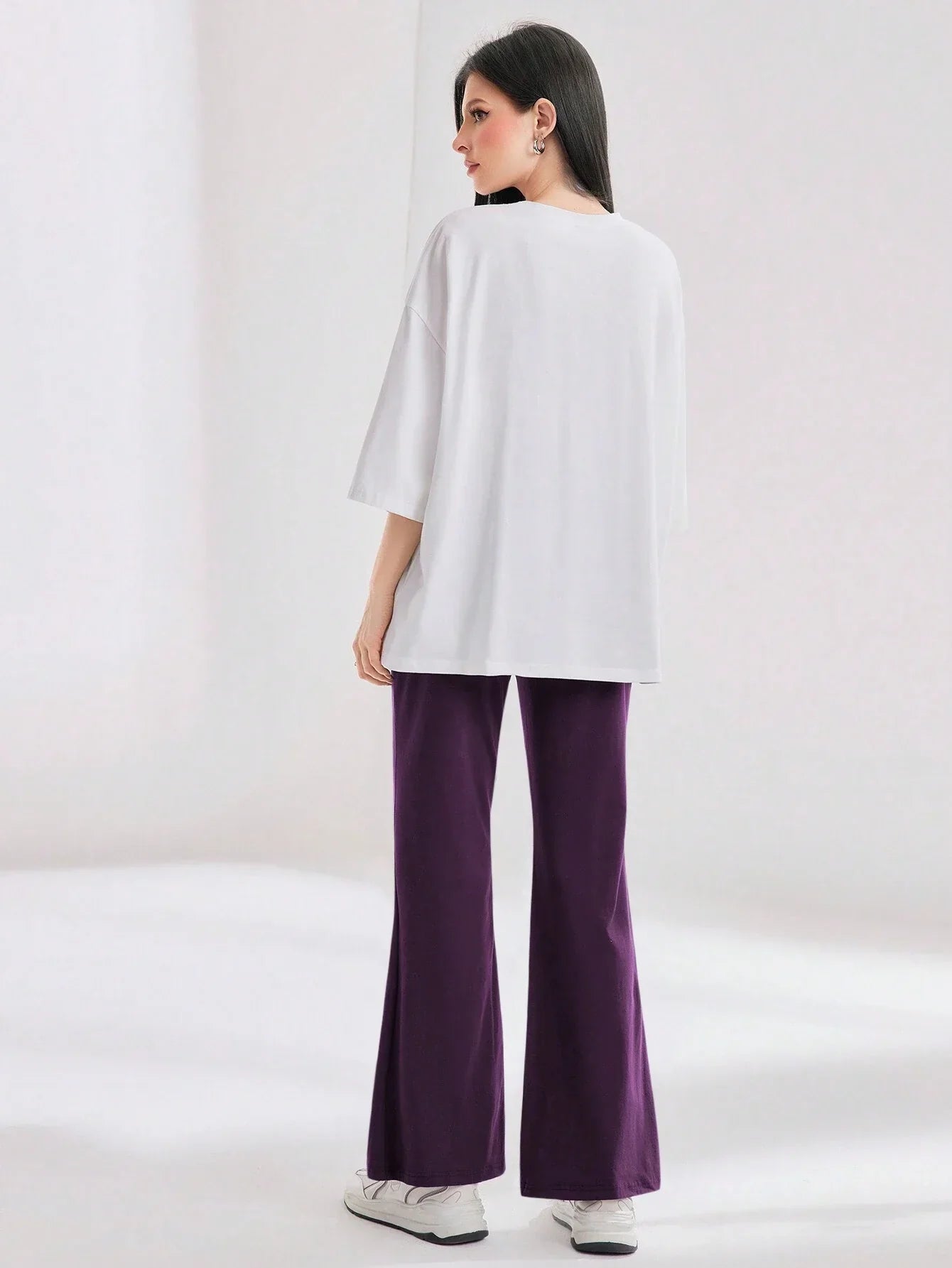 Mulvari Women Spring/Summer Casual Loose Fit Drop Shoulder Short Sleeve Top And Flared Pants Set shein