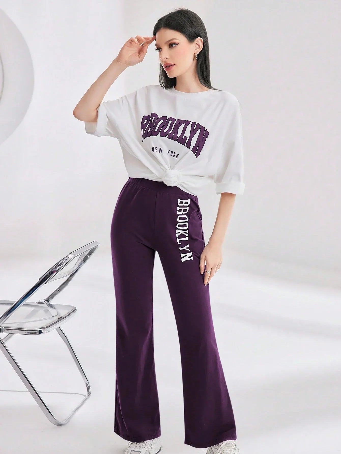 Mulvari Women Spring/Summer Casual Loose Fit Drop Shoulder Short Sleeve Top And Flared Pants Set shein
