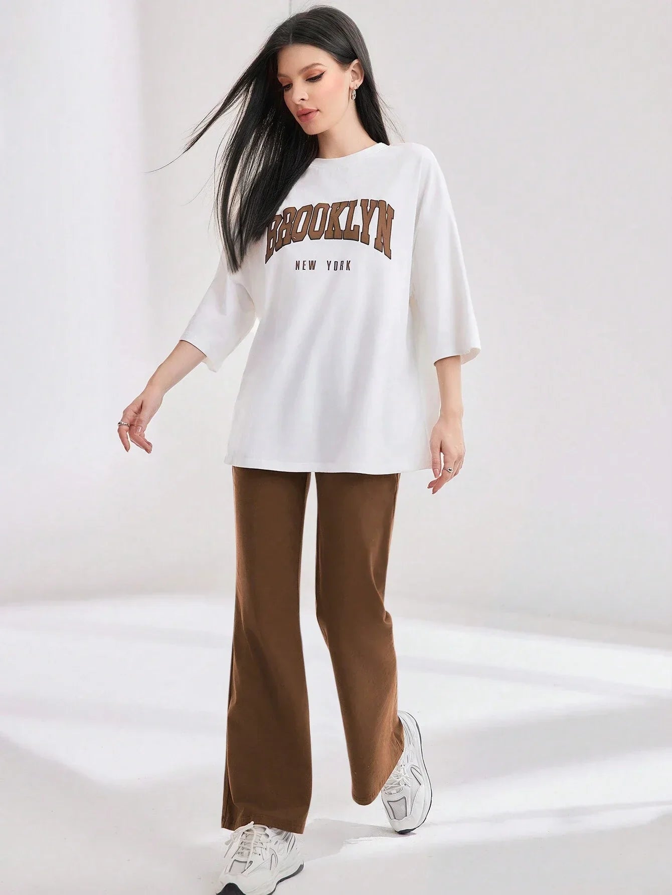Mulvari Women Spring/Summer Casual Loose Fit Drop Shoulder Short Sleeve Top And Flared Pants Set shein