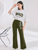 Mulvari Women Spring/Summer Casual Loose Fit Drop Shoulder Short Sleeve Top And Flared Pants Set shein
