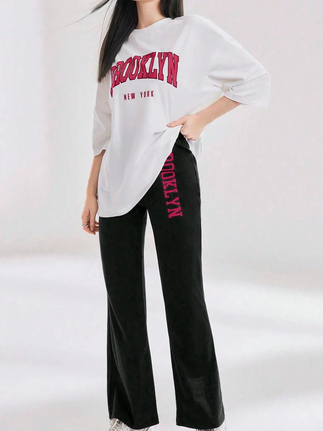 Mulvari Women Spring/Summer Casual Loose Fit Drop Shoulder Short Sleeve Top And Flared Pants Set shein