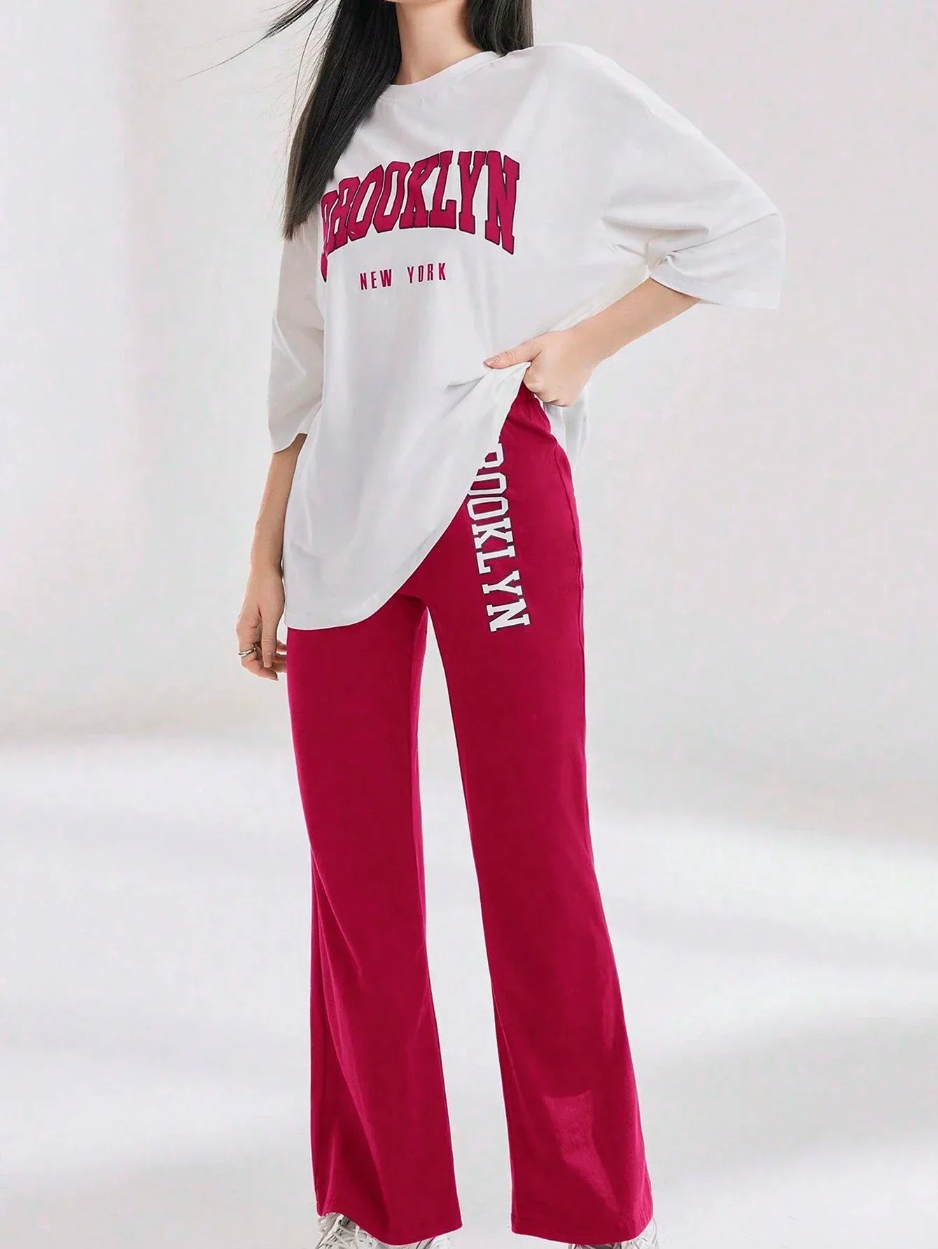 Mulvari Women Spring/Summer Casual Loose Fit Drop Shoulder Short Sleeve Top And Flared Pants Set shein