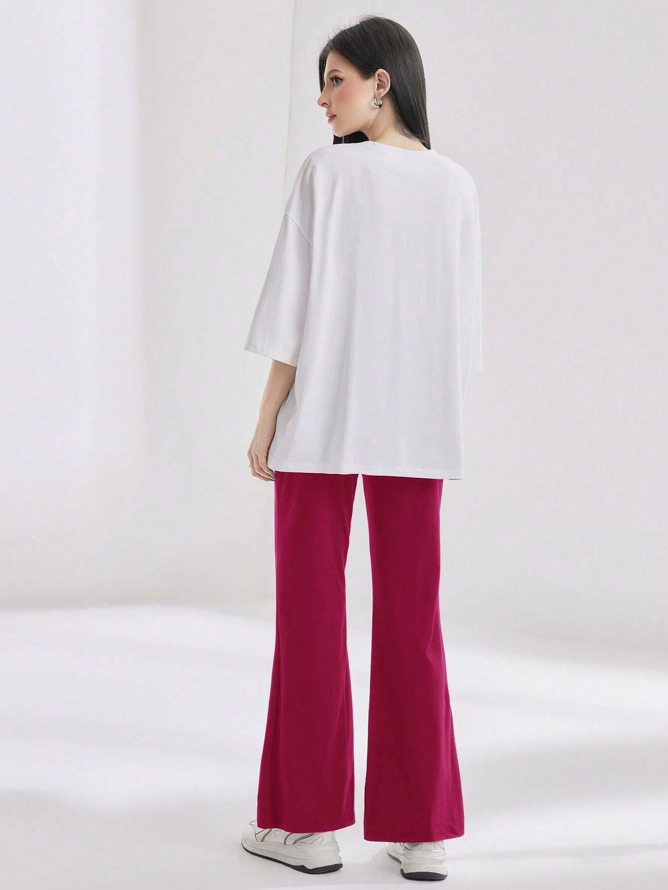 Mulvari Women Spring/Summer Casual Loose Fit Drop Shoulder Short Sleeve Top And Flared Pants Set shein