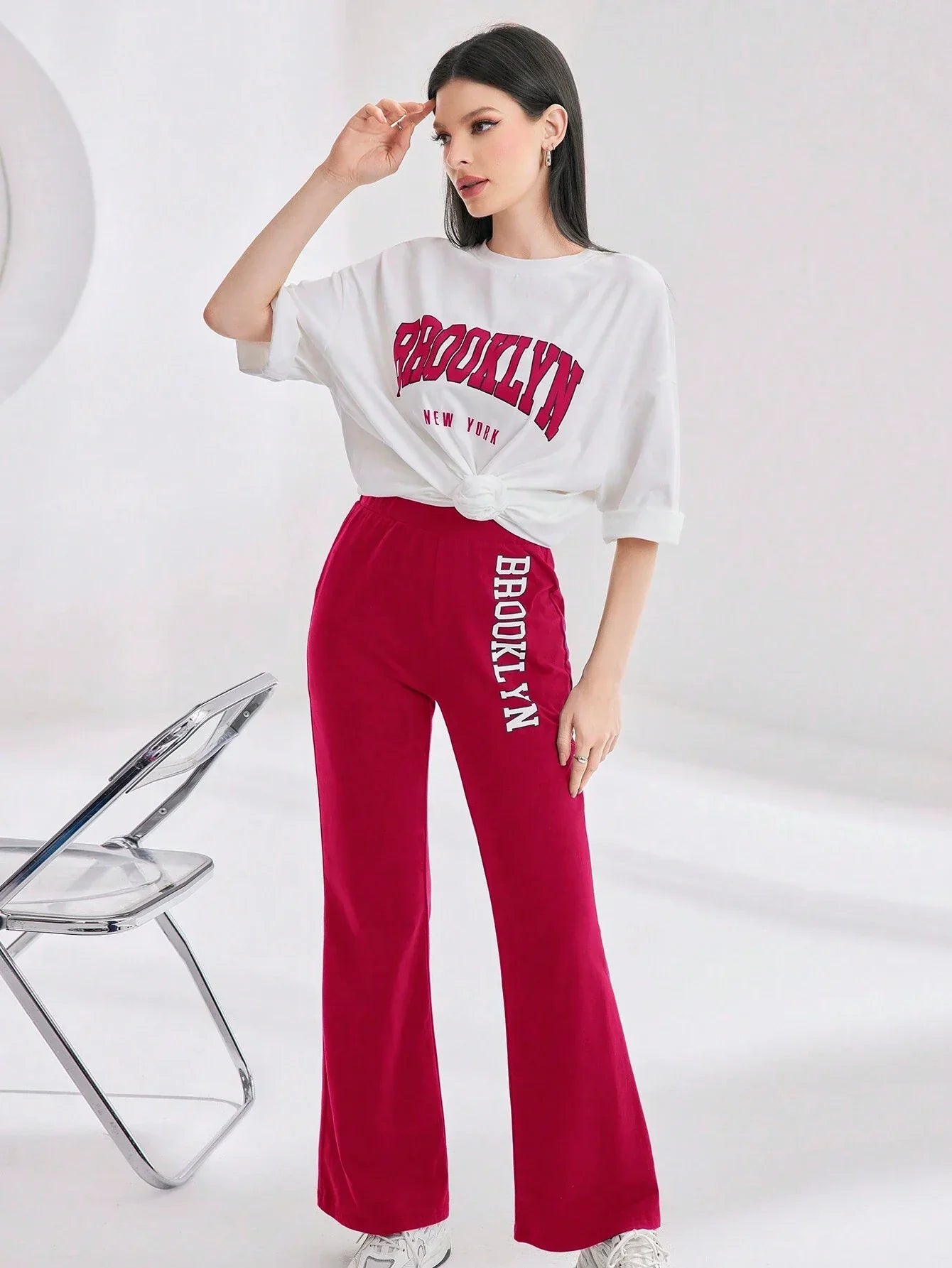 Mulvari Women Spring/Summer Casual Loose Fit Drop Shoulder Short Sleeve Top And Flared Pants Set shein