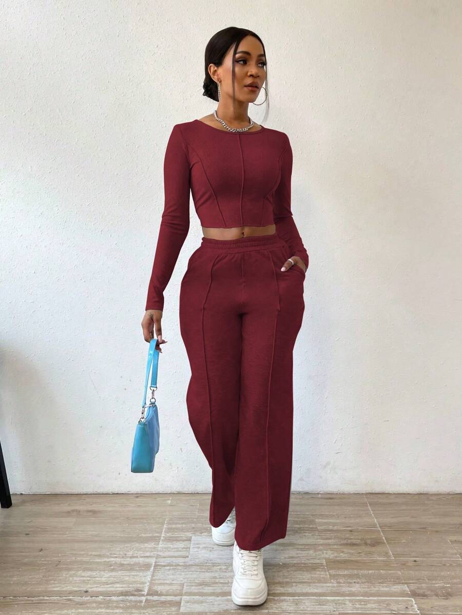 Solid Color Round Neck Top With Exposed Stitching And Waist Belt & Pocket Detail Pants shein
