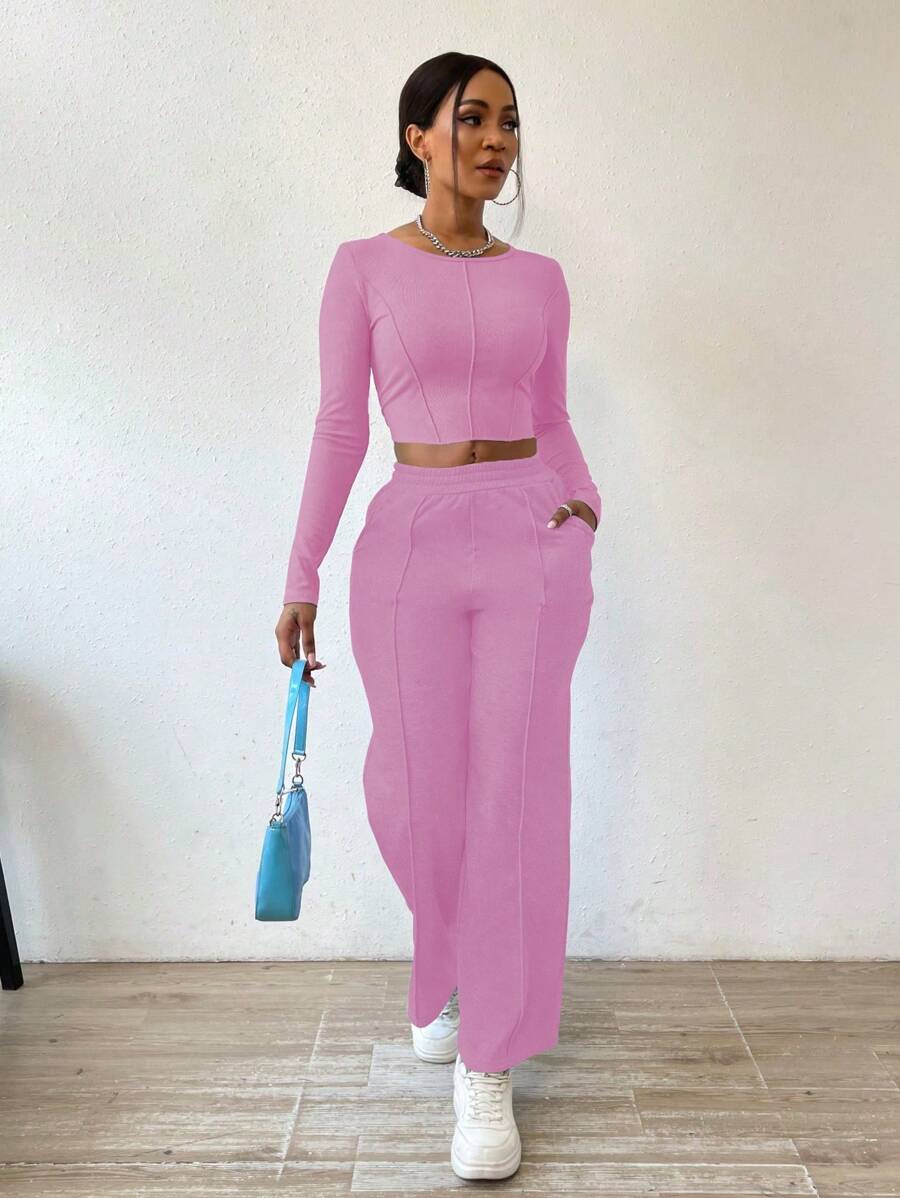 Solid Color Round Neck Top With Exposed Stitching And Waist Belt & Pocket Detail Pants shein