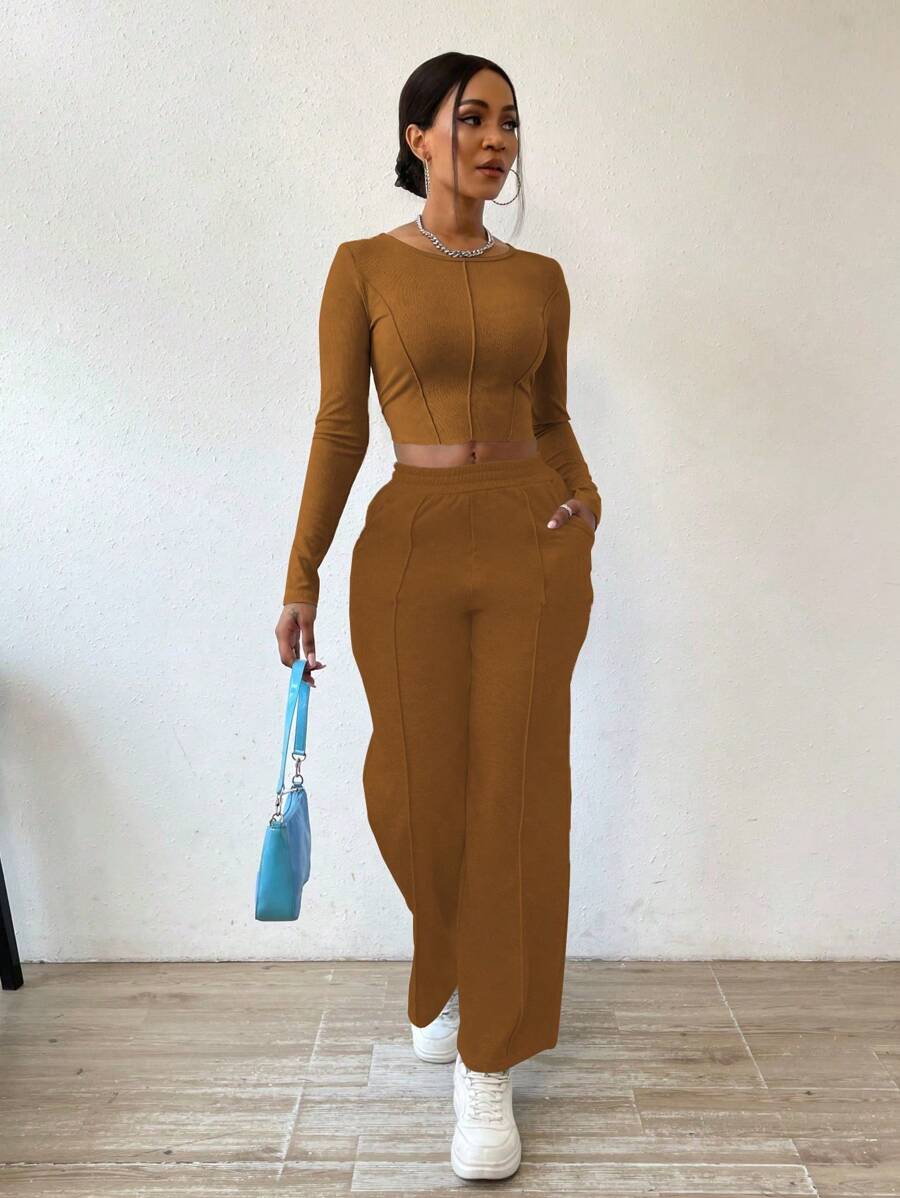 Solid Color Round Neck Top With Exposed Stitching And Waist Belt & Pocket Detail Pants shein