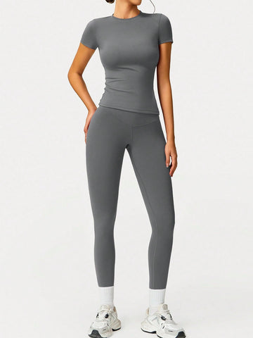 2pcs Women Soft Moisture Wicking Crew Neck Short Sleeve Top And Elastic Yoga Sports Pants