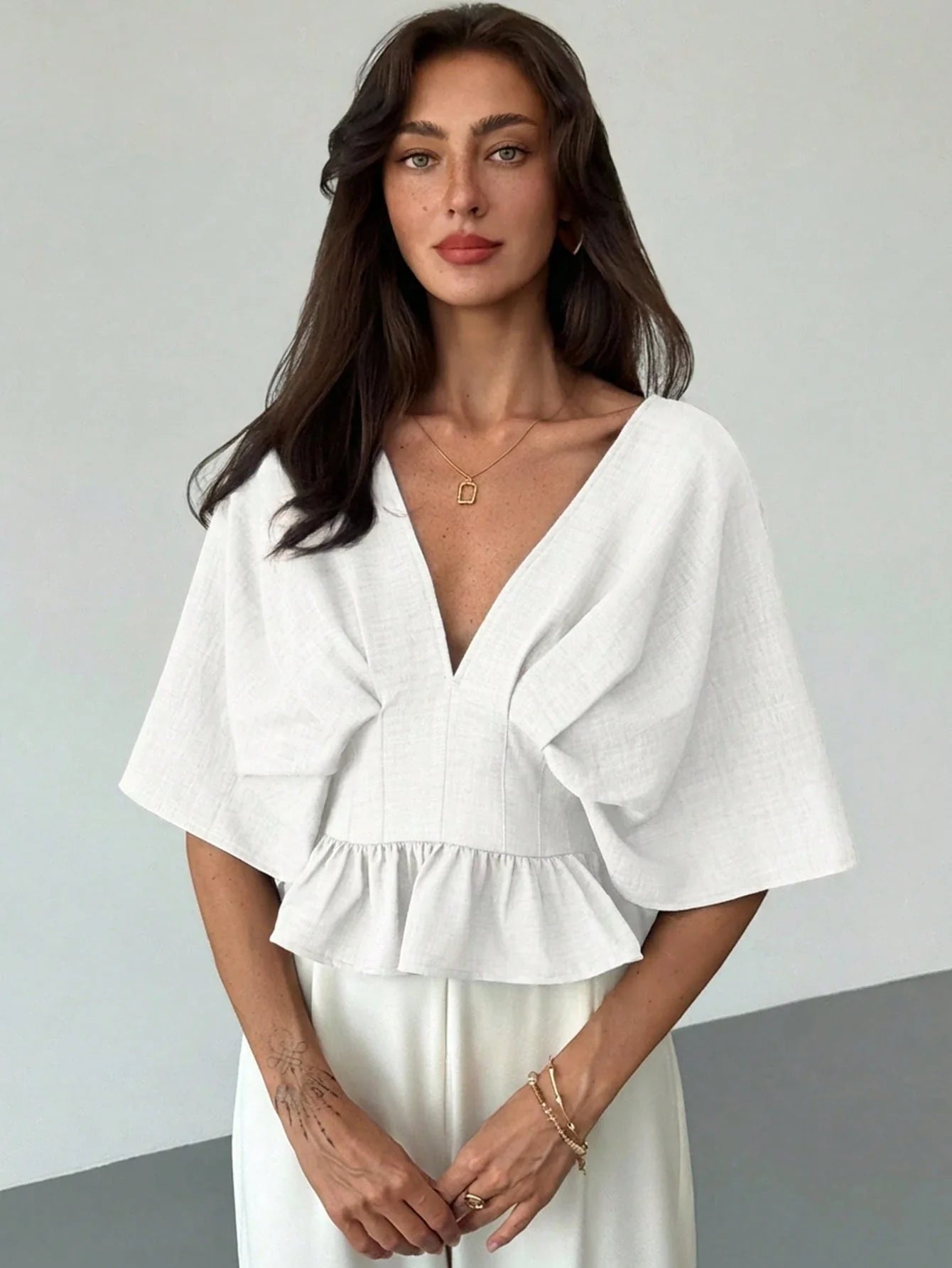 Solid Color V-Neck Ruffle Hem Blouse shein