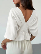 Solid Color V-Neck Ruffle Hem Blouse shein