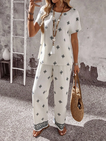Women Solid Color Round Neck Short Sleeve Top And Flower Print Wide Leg Pants Set