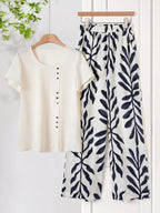 Women Solid Color Round Neck Short Sleeve Top And Flower Print Wide Leg Pants Set shein