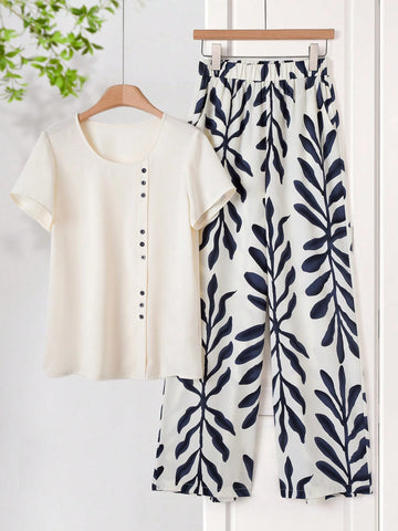 Women Solid Color Round Neck Short Sleeve Top And Flower Print Wide Leg Pants Set