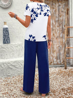 Women Solid Color Round Neck Short Sleeve Top And Flower Print Wide Leg Pants Set shein