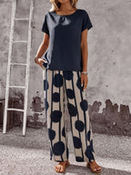 Women Solid Color Round Neck Short Sleeve Top And Flower Print Wide Leg Pants Set shein