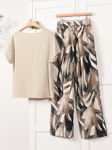 Women Solid Color Round Neck Short Sleeve Top And Flower Print Wide Leg Pants Set