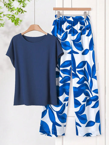 Women Solid Color Round Neck Short Sleeve Top And Flower Print Wide Leg Pants Set