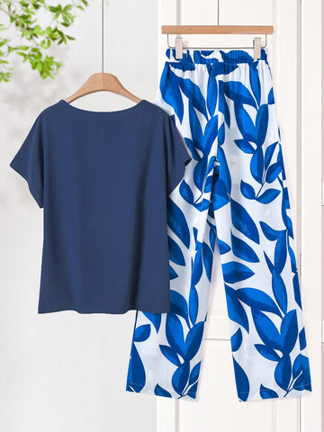 Women Solid Color Round Neck Short Sleeve Top And Flower Print Wide Leg Pants Set