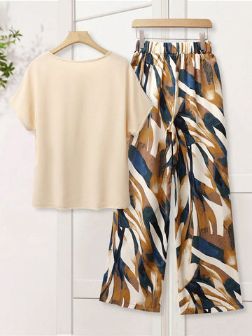 Women Solid Color Round Neck Short Sleeve Top And Flower Print Wide Leg Pants Set