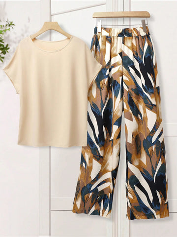 Women Solid Color Round Neck Short Sleeve Top And Flower Print Wide Leg Pants Set