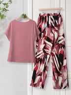 Women Solid Color Round Neck Short Sleeve Top And Flower Print Wide Leg Pants Set shein
