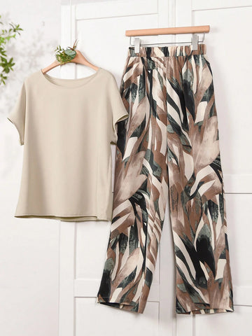Women Solid Color Round Neck Short Sleeve Top And Flower Print Wide Leg Pants Set