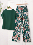 Women Solid Color Round Neck Short Sleeve Top And Flower Print Wide Leg Pants Set shein