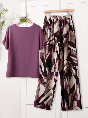 Women Solid Color Round Neck Short Sleeve Top And Flower Print Wide Leg Pants Set