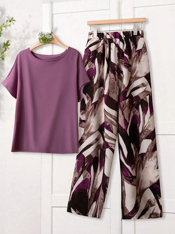 Women Solid Color Round Neck Short Sleeve Top And Flower Print Wide Leg Pants Set