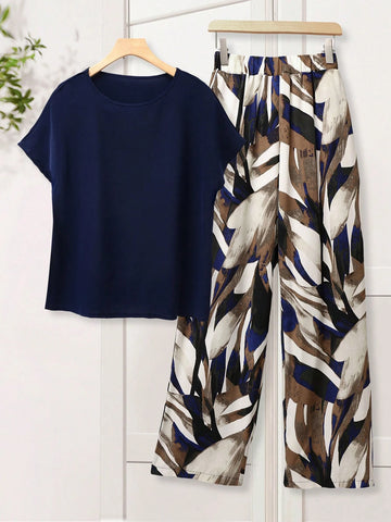 Women Solid Color Round Neck Short Sleeve Top And Flower Print Wide Leg Pants Set