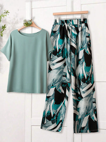 Women Solid Color Round Neck Short Sleeve Top And Flower Print Wide Leg Pants Set