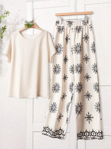 Women Solid Color Round Neck Short Sleeve Top And Flower Print Wide Leg Pants Set