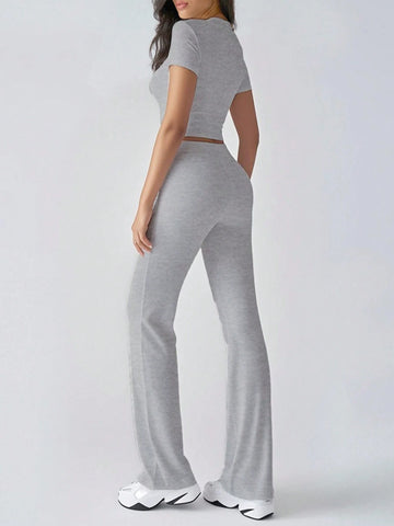 Women's Fashionable Navel-Baring Short-Sleeved Tops, Slim-Fitting Lace-Up Flared Pants