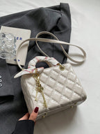 The New Fashion Classic Pu Waterproof Fabric Was Quilted And Embroidered With Diamond Shape Design shein