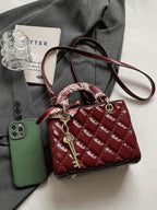 The New Fashion Classic Pu Waterproof Fabric Was Quilted And Embroidered With Diamond Shape Design shein