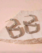1 Pair Luxury Diamond Encrusted Geometric Letter Stud Earrings shein