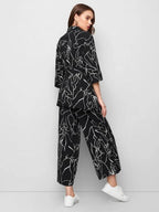Collared Self Belted Allover Print Blouse & Wide Leg Pants Set Shein